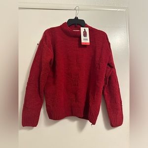 Women’s sweater in size medium. Brand new with tag. Color red. Super cute!!!!